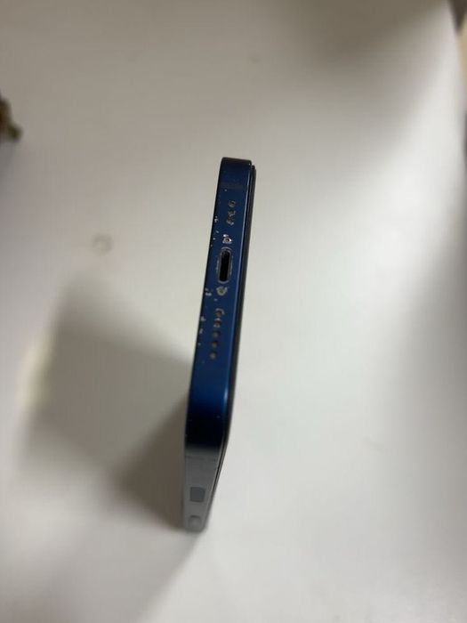 iPhone 12 - 64GB in good condition.