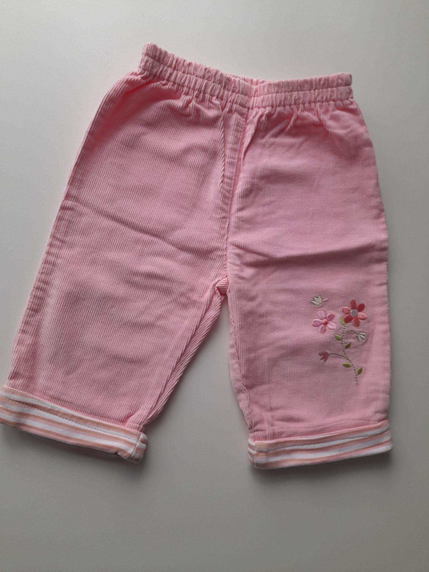 Nowe spodnie dla dziewczynki r.62 kwiatki haftowane różowe zamienię