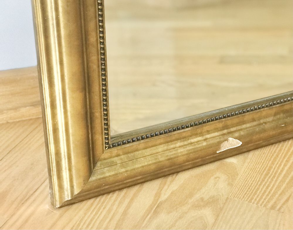 Duże lustro w złotej ramie Ikea Levanger