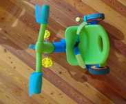Triciclo de bebe da marca Imaginarium