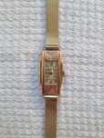 Złoty zegarek vintage Reville 14k