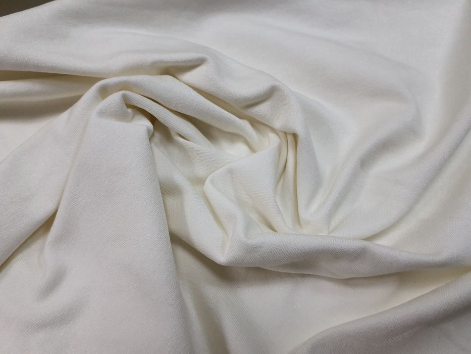 Dzianina ecru II gat.szer.164 cm.