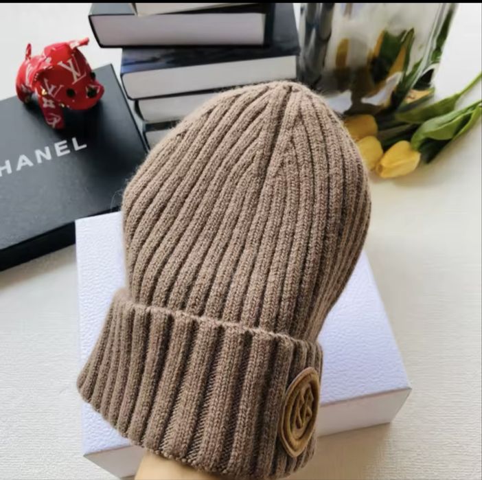 Шапки Руслан Багінский