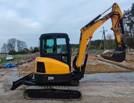 koparka caterpillar CAT 302.7 DCR 2015 - Bobcat E35, ładowarka Volvo