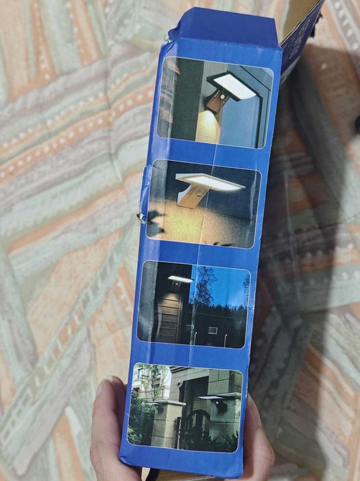 Luz exterior com painel solar