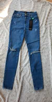 Nowe z metkami spodnie jeansowe z dziurami Only 30/34 rozmiar M