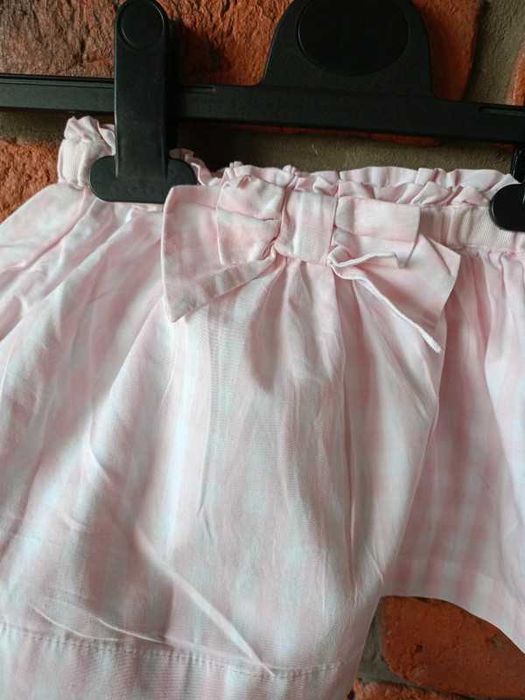 Spódniczka dziewczęca w kratkę z kokardką różowa na gumce