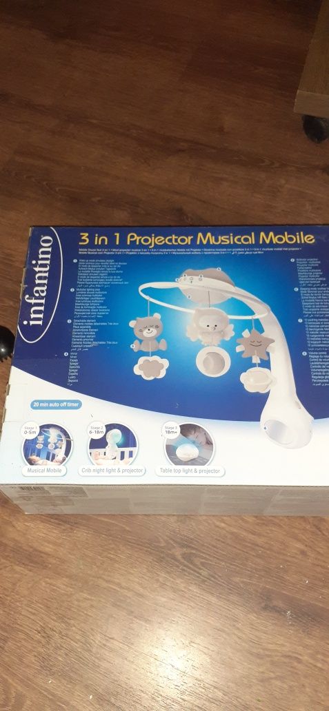 Продам Музыкальный мобиль Infantino 3 в 1 с проектором Серый