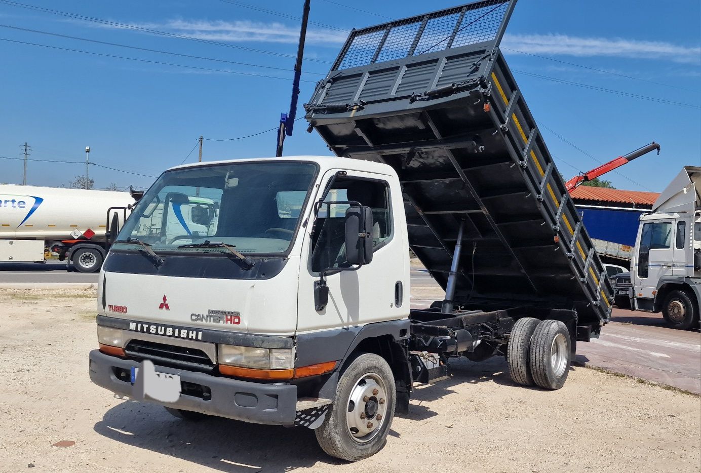 Mitsubishi Canter 659 HD basculante tri lateral