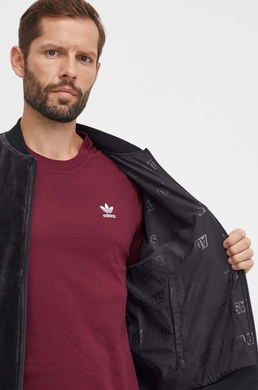 Двостороння куртка-бомбер Adidas
чоловіча колір чорний M oversize