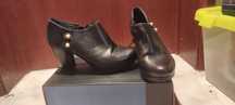 Botins pretos salto alto