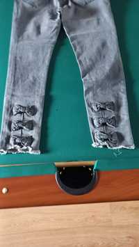 Spodnie damskie jeans szare,rozciągliwe, z tyłu  kokardki, rozmiar 40