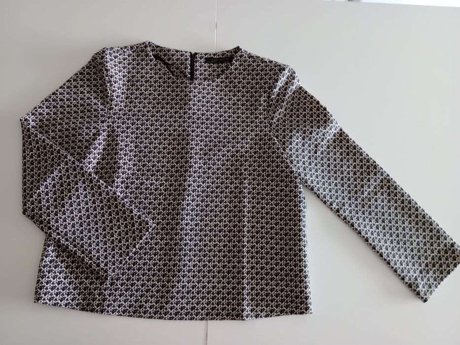 Conjunto camisola e calça.