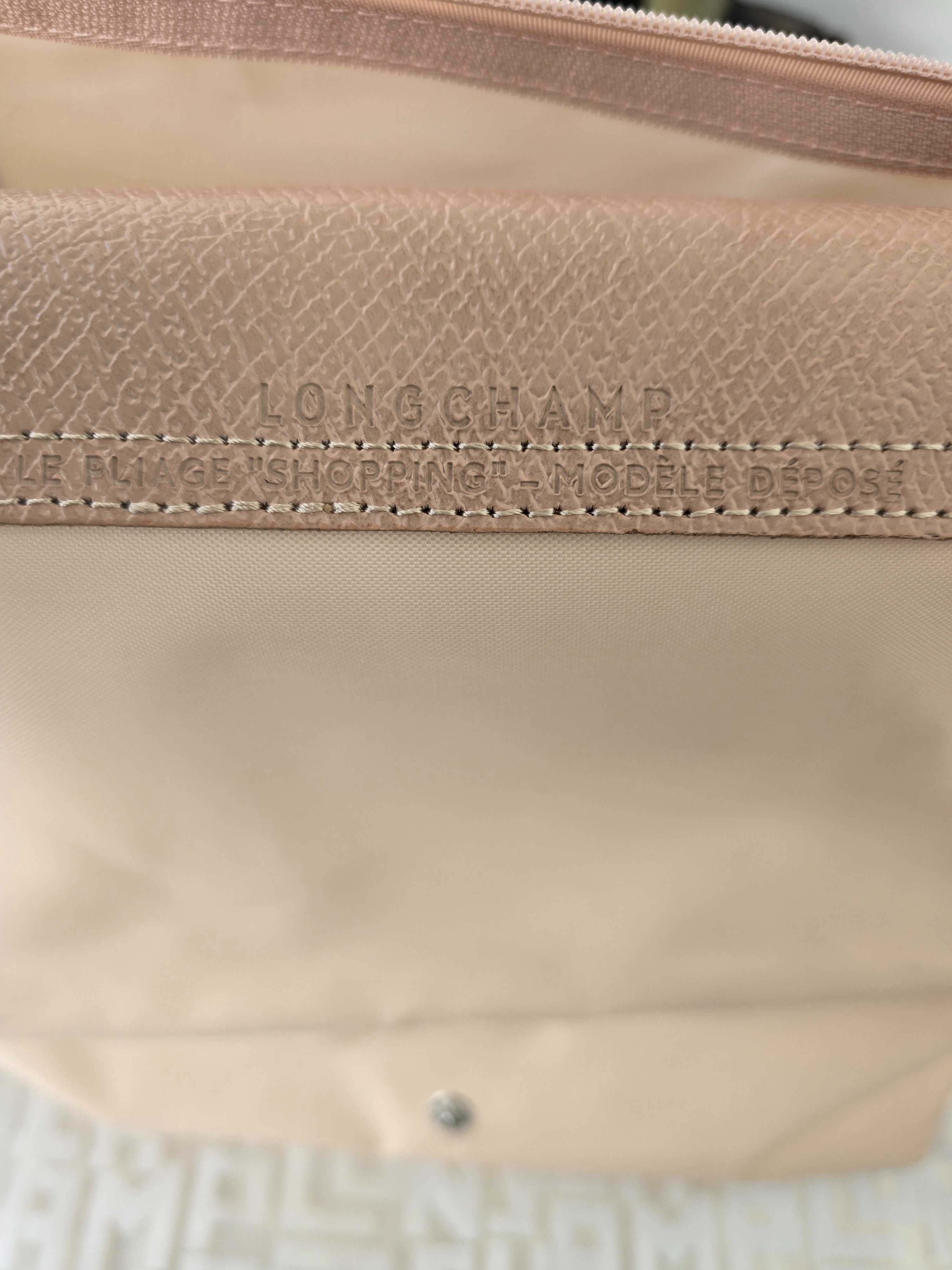Mala Longchamp em rosa claro. Tamanho L.