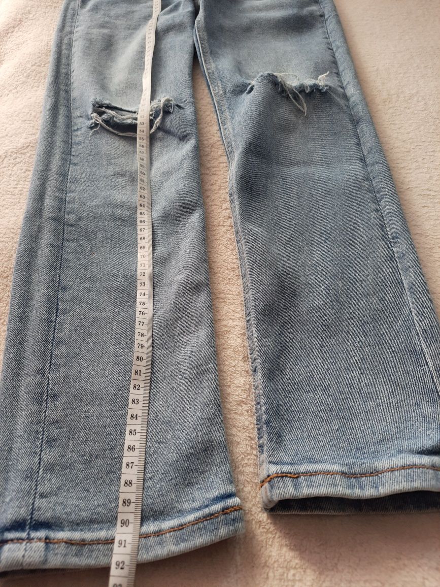 Spodnie jeansowe Reserved 158