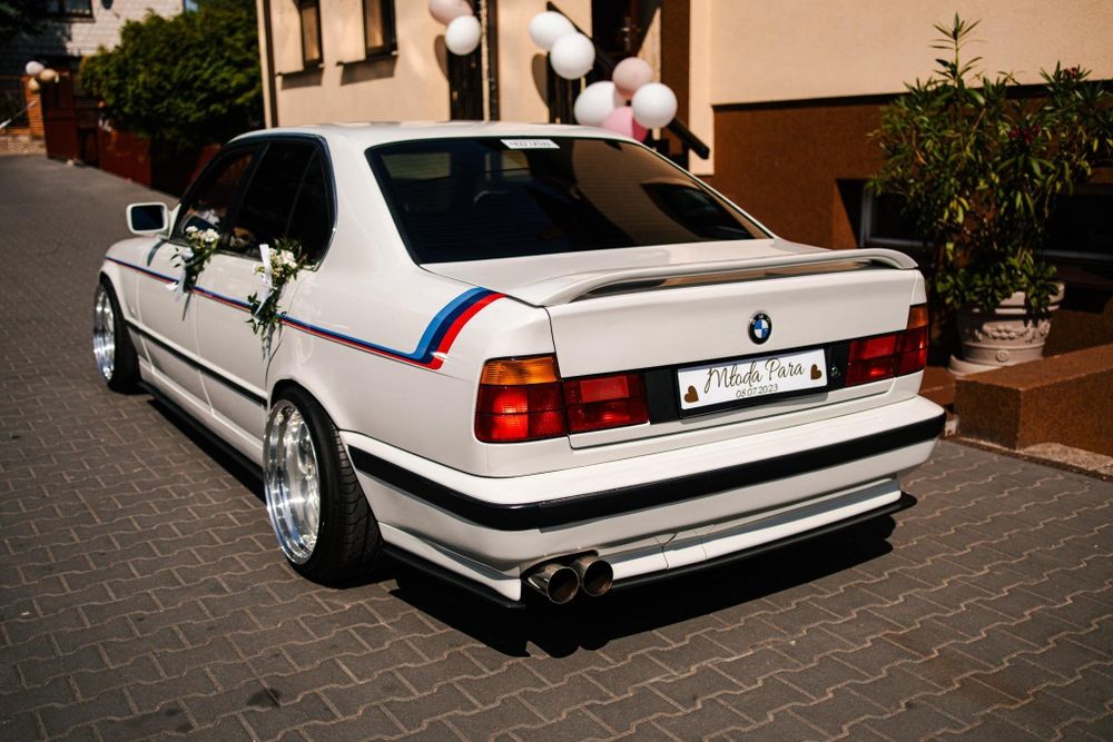Auto do ślubu wynajem BMW E34 530i V8 Manual