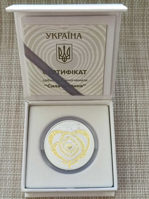 Срібна монета " Сила кохання"  2025 р. 1 ун. срібло 0.925. Позолота