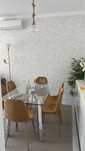 Mesa de vidro retangular com 6 lugares