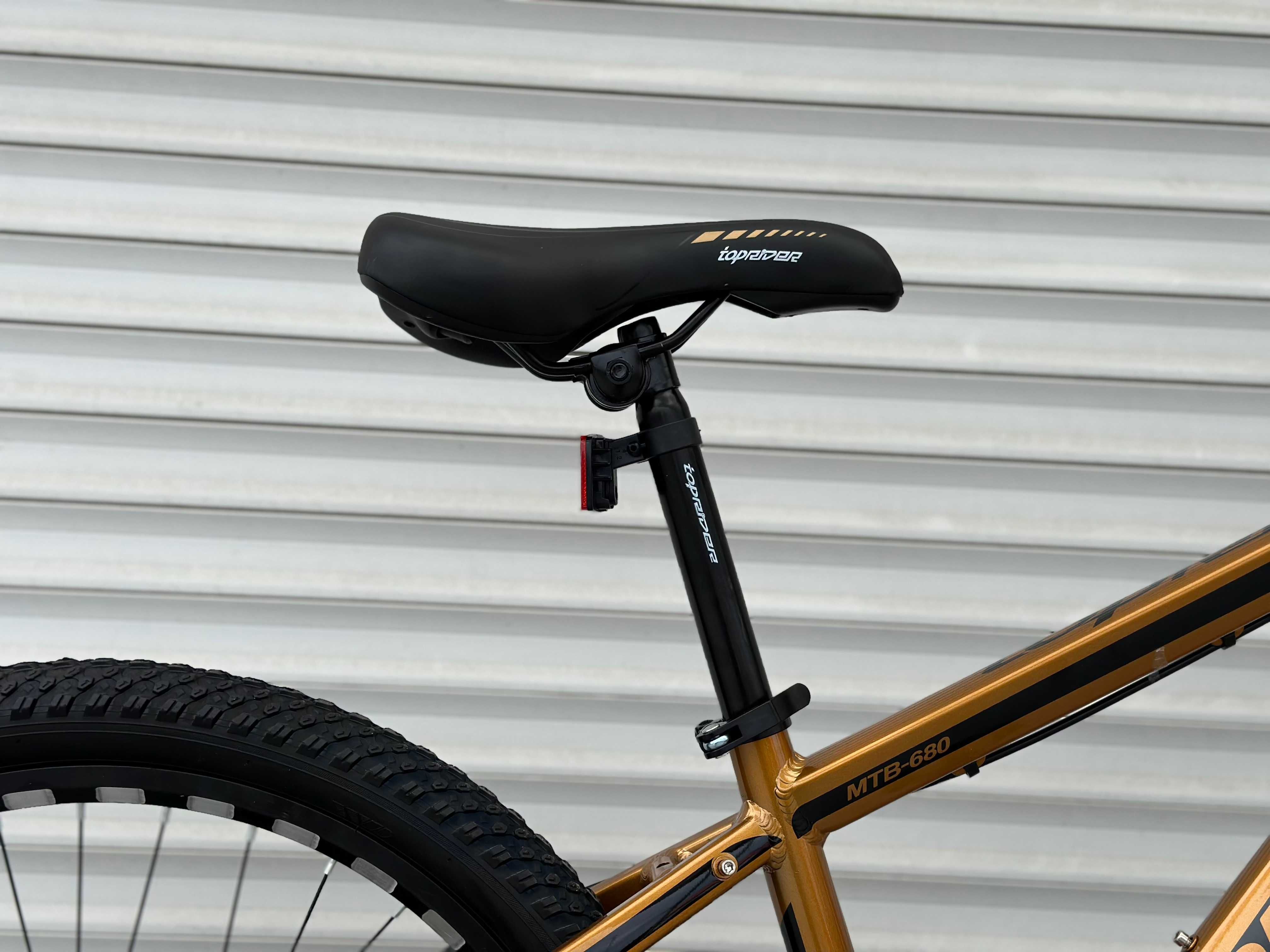 Горний велосипед рама алюмінієва колеса 24 дюймів оранжевий