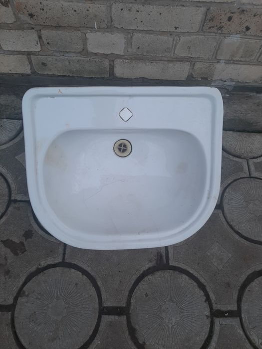 Раковина керамическая