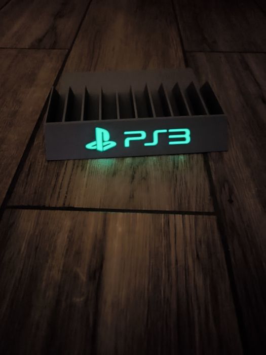 Stojak podstawka na gry PS3  napis fluorescencyjny