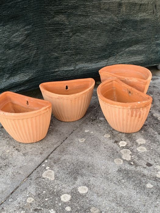 Vasos de barro para parede