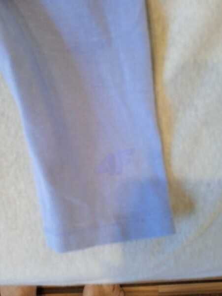 Leginsy długie z firmy 4f w rozmiarze 134.