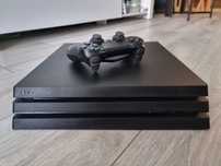 Playstation 4 Pro 1TB CUH 7216b + Pad z efekt halla.