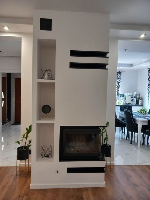 Kominek z szybą boczną narożny kominki