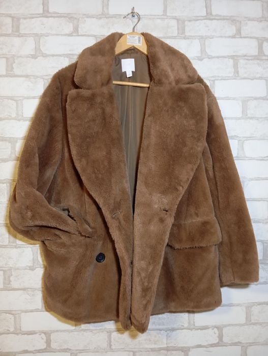 Кожушок зі штучного хутра колір кава з молоком. 46-48