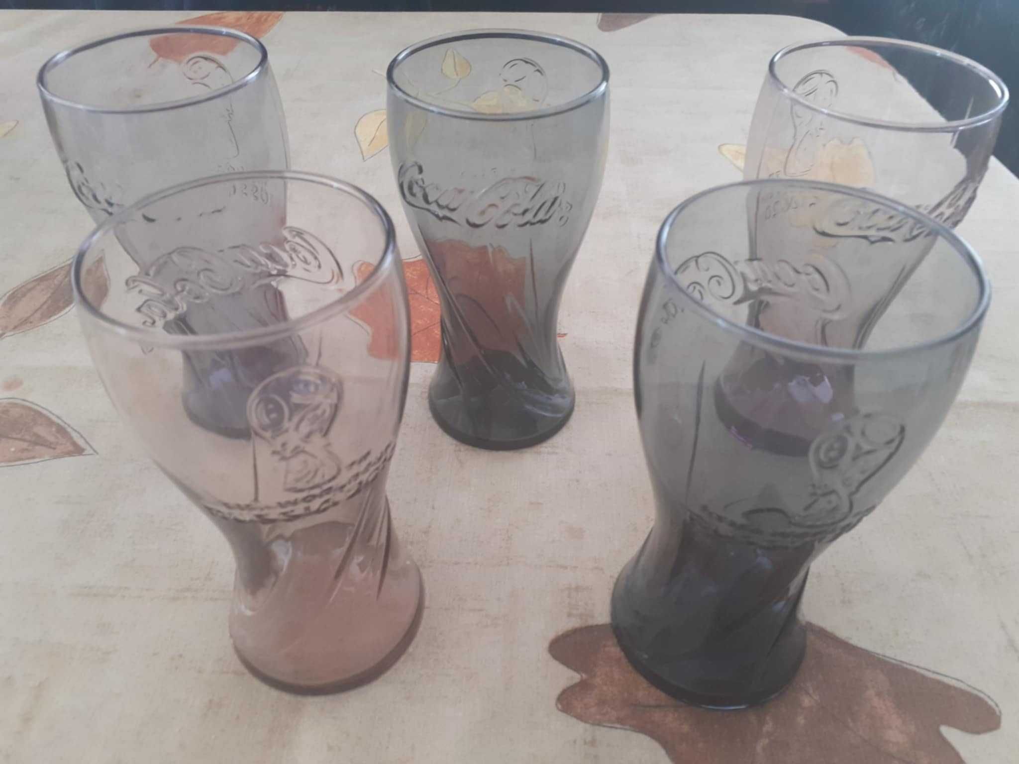 Copos Coca-Cola novos para desocupar