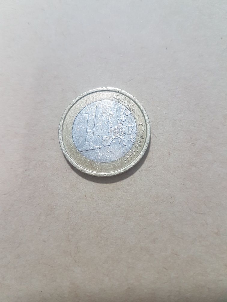 Moeda 1 euro Itália de 2002,com defeito.