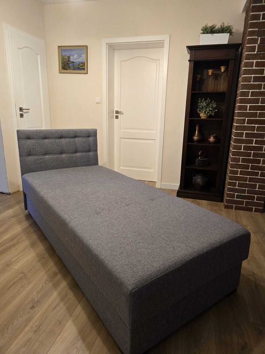 Łóżko tapicerowane z pojemnikiem