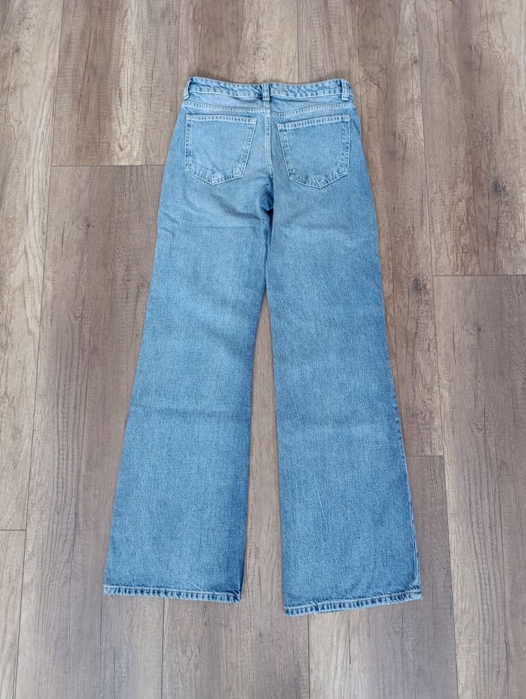 Spodnie jeansowe damskie dżinsy z rozdarciami Bershka 34 szerokie