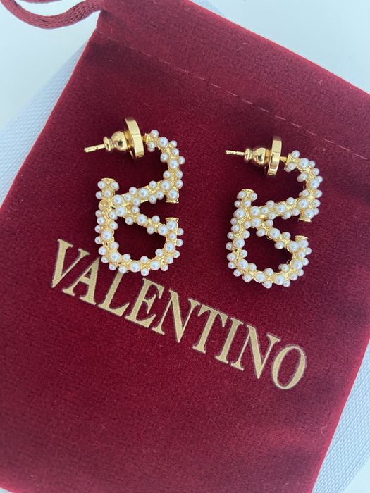 Brincos Valentino