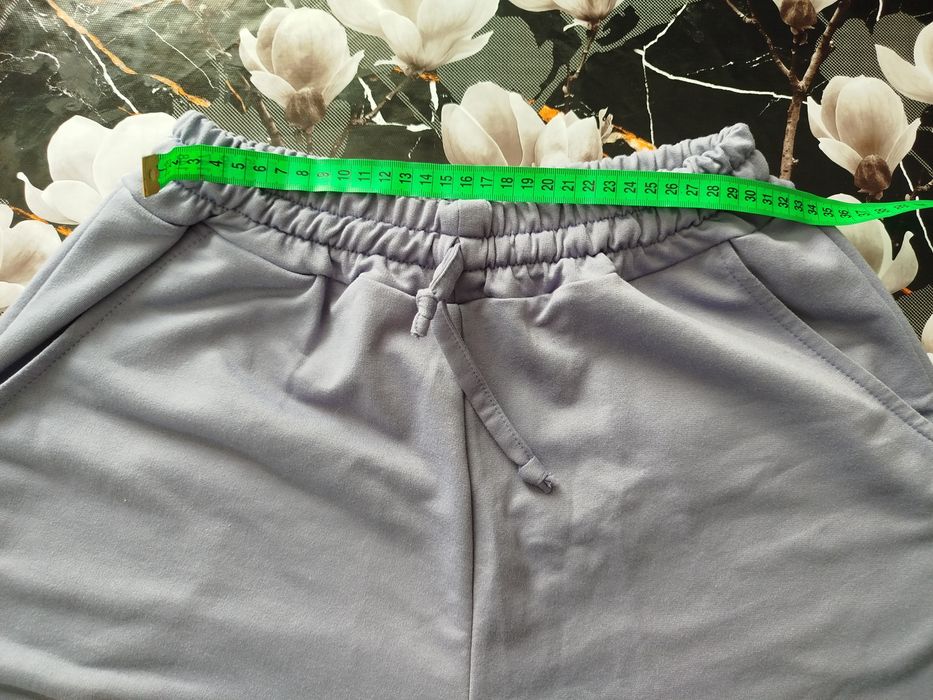 Костюм бузкового кольору