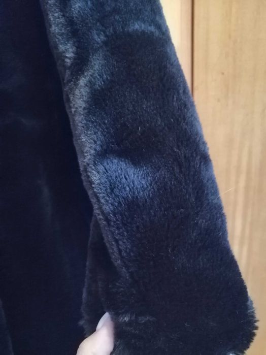 Casaco de pelo preto