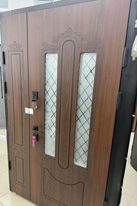 Двері вхідні Вікна