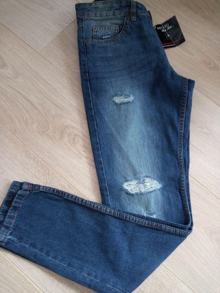 Spodnie dżinsy z dziurami nowe roz 34