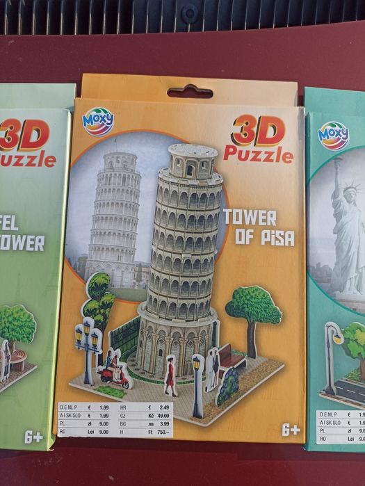 Trzy paczki Puzzli 3D Wieża Eiffla,krzywa wieża i statua wolności