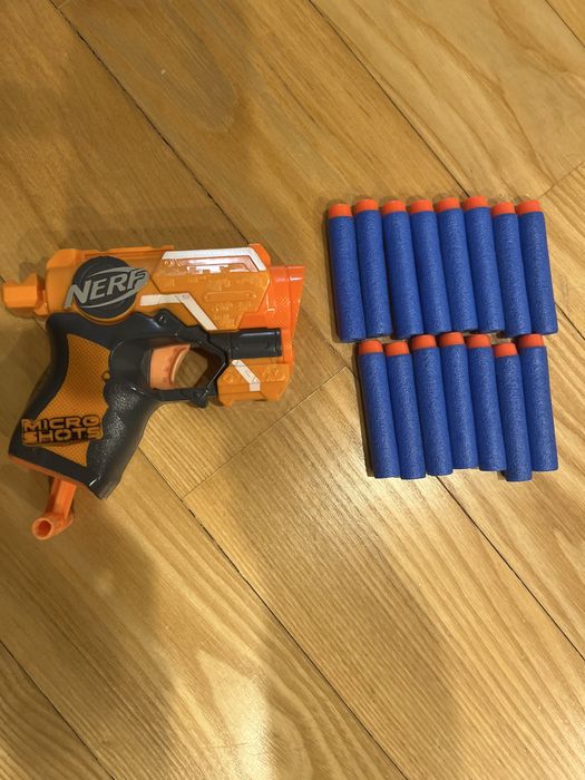 Pistolet NERF Microshots + 15 strzałek
