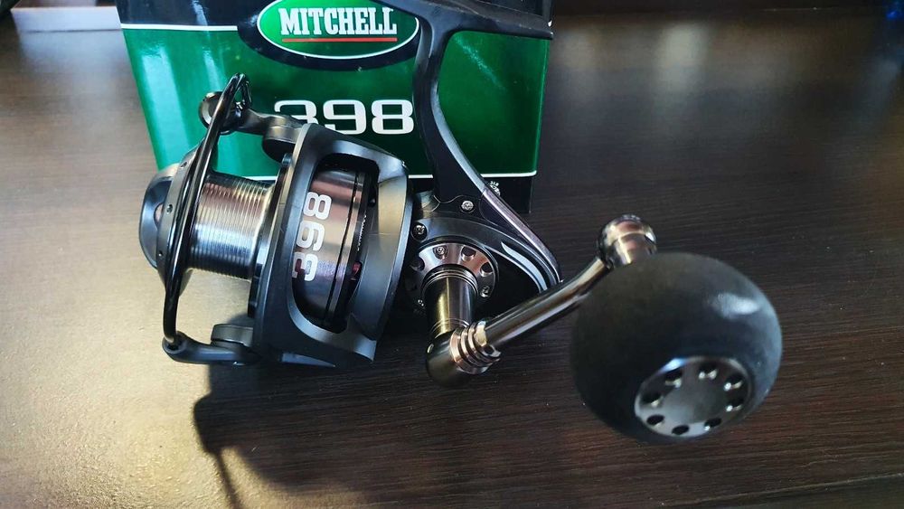 Mocny kołowrotek spinningowy Mitchell 398 / morze, sum