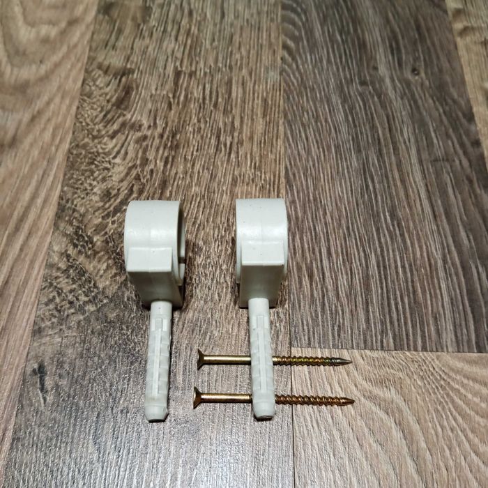 Тримач (обойма) для труб (кабелю) 25-27мм