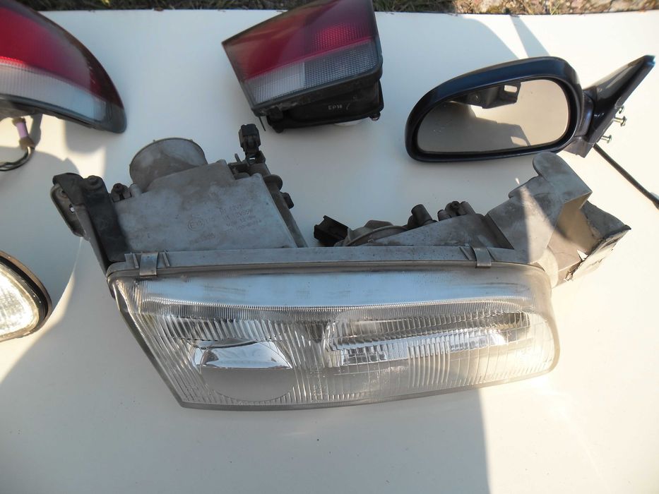 Lampy tylne komplet Mazda 626 sedan '96