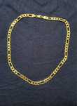Pozłacany 18k złotem Złoty łańcuszek łańcuch figaro 7mm 55cm 35,8g