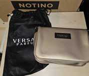 Złota torebka Versace Parfums ze złotym łańcuszkiem