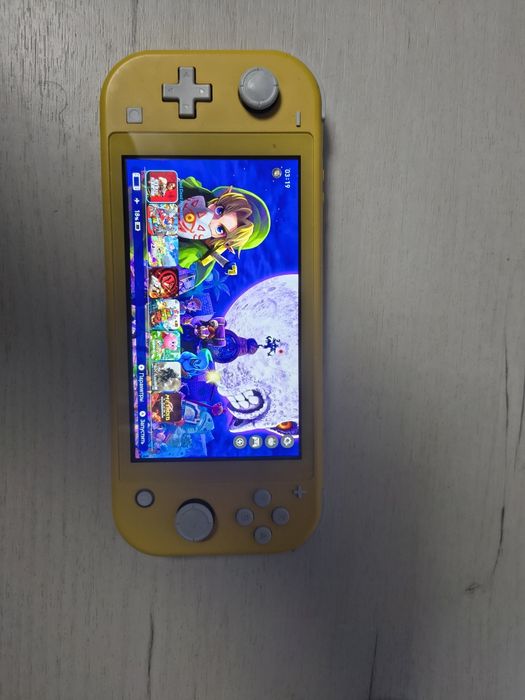 Nintendo switch lite + багато ігор