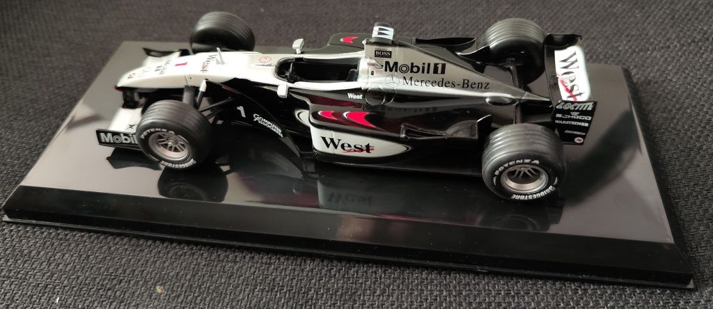 Unikat Model F1 McLaren Mercedes Benz 4/14 M.Hakkinen West 1999  1:24