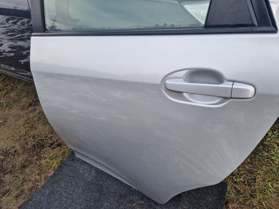 Drzwi lewe toyota verso s przód,tyl 1F7
