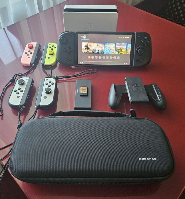 Nintendo Switch Oled + багато аксесуарів + картридж Minecraft